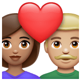 Whatsapp design of the couple with heart: woman man medium skin tone medium-light skin tone emoji verson:2.23.2.72