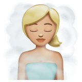 Whatsapp design of the woman in steamy room: medium-light skin tone emoji verson:2.23.2.72