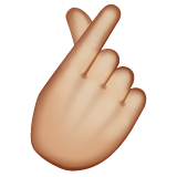 Whatsapp design of the hand with index finger and thumb crossed: medium-light skin tone emoji verson:2.23.2.72