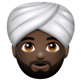 Whatsapp design of the person wearing turban: dark skin tone emoji verson:2.23.2.72