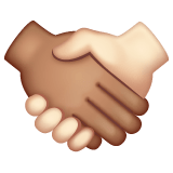 Whatsapp design of the handshake: medium skin tone light skin tone emoji verson:2.23.2.72