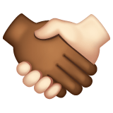 Whatsapp design of the handshake: medium-dark skin tone light skin tone emoji verson:2.23.2.72