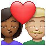 Whatsapp design of the kiss: woman man medium-dark skin tone medium-light skin tone emoji verson:2.23.2.72