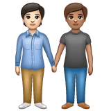 Whatsapp design of the people holding hands: light skin tone medium skin tone emoji verson:2.23.2.72