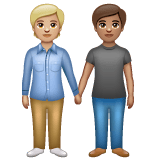 Whatsapp design of the people holding hands: medium-light skin tone medium skin tone emoji verson:2.23.2.72