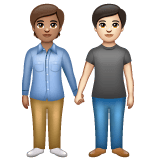 Whatsapp design of the people holding hands: medium skin tone light skin tone emoji verson:2.23.2.72