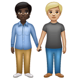 Whatsapp design of the people holding hands: dark skin tone medium-light skin tone emoji verson:2.23.2.72