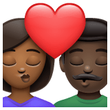 Whatsapp design of the kiss: woman man medium-dark skin tone dark skin tone emoji verson:2.23.2.72