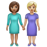 Whatsapp design of the women holding hands: medium skin tone medium-light skin tone emoji verson:2.23.2.72