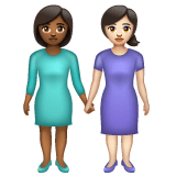 Whatsapp design of the women holding hands: medium-dark skin tone light skin tone emoji verson:2.23.2.72