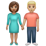 Whatsapp design of the woman and man holding hands: medium skin tone medium-light skin tone emoji verson:2.23.2.72