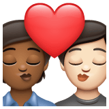Whatsapp design of the kiss: person person medium-dark skin tone light skin tone emoji verson:2.23.2.72