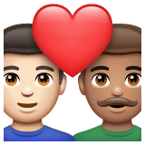 Whatsapp design of the couple with heart: man man light skin tone medium skin tone emoji verson:2.23.2.72