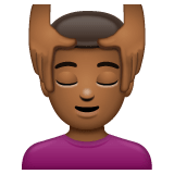 Whatsapp design of the man getting massage: medium-dark skin tone emoji verson:2.23.2.72