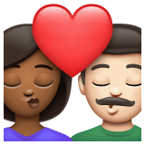 Whatsapp design of the kiss: woman man medium-dark skin tone light skin tone emoji verson:2.23.2.72
