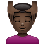 Whatsapp design of the man getting massage: dark skin tone emoji verson:2.23.2.72