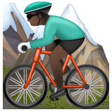 Whatsapp design of the person mountain biking: dark skin tone emoji verson:2.23.2.72