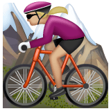 Whatsapp design of the woman mountain biking: medium-light skin tone emoji verson:2.23.2.72