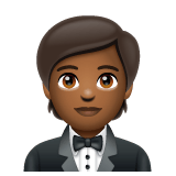 Whatsapp design of the person in tuxedo: medium-dark skin tone emoji verson:2.23.2.72
