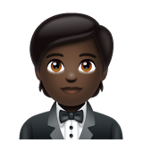 Whatsapp design of the person in tuxedo: dark skin tone emoji verson:2.23.2.72