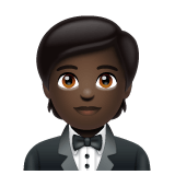 Whatsapp design of the person in tuxedo: dark skin tone emoji verson:2.23.2.72