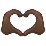Whatsapp design of the heart hands: dark skin tone emoji verson:2.23.2.72