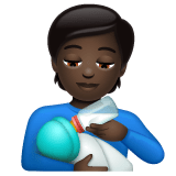 Whatsapp design of the person feeding baby: dark skin tone emoji verson:2.23.2.72