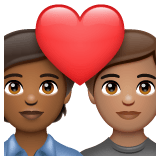 Whatsapp design of the couple with heart: person person medium-dark skin tone medium skin tone emoji verson:2.23.2.72