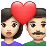 Whatsapp design of the couple with heart: woman man light skin tone emoji verson:2.23.2.72